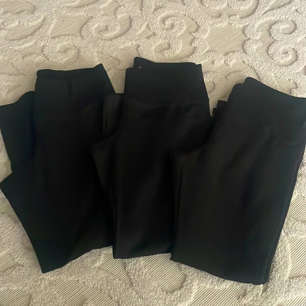 3 Pair of Like New High Waisted Danskin Size Medium Yoga Pants With Pockets.